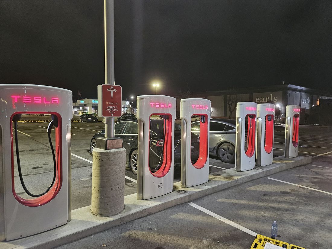 Supercharger stalls at night with the bollards removed and concrete patched