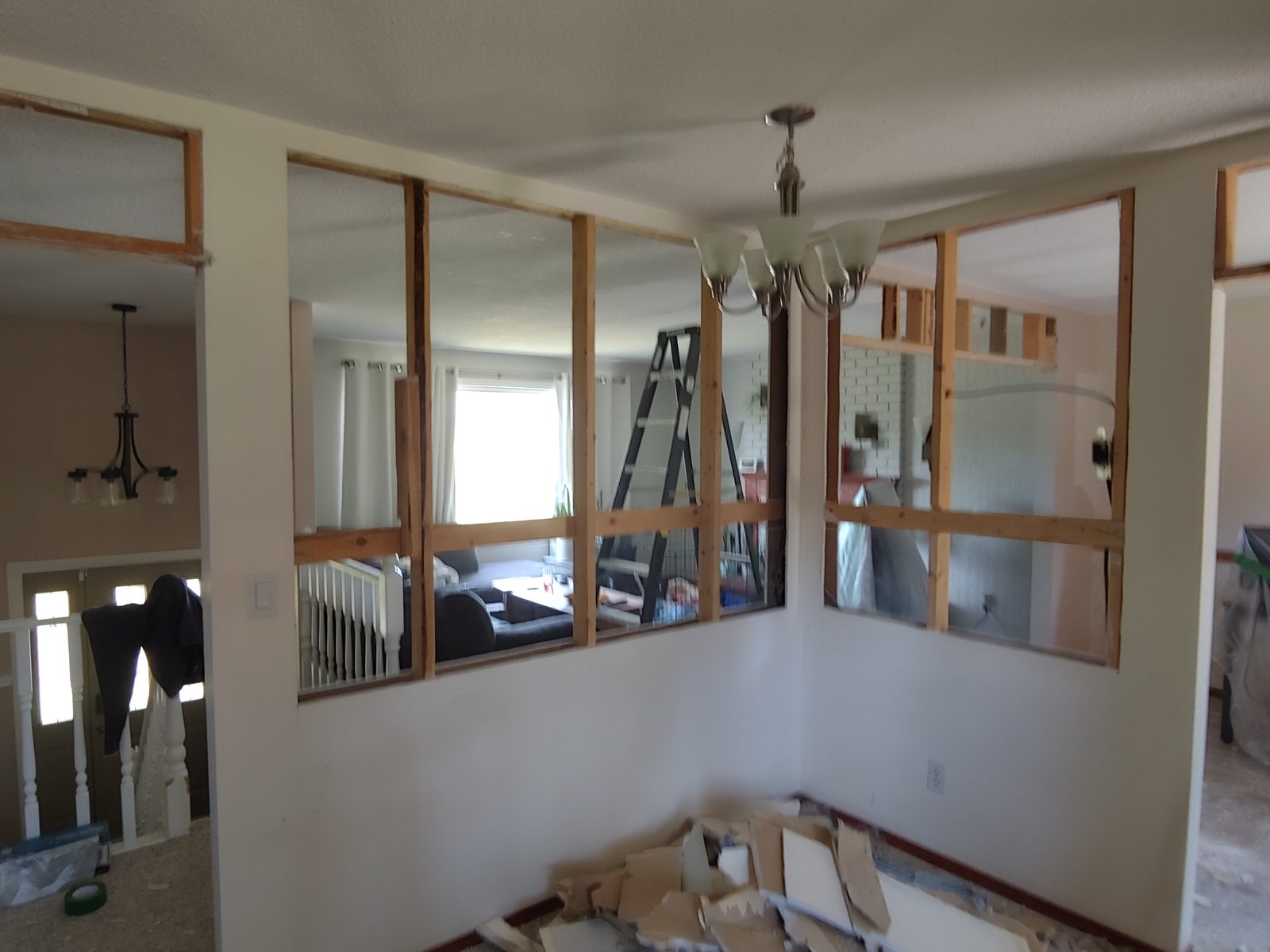Sections of an interior wall removed to open a kitchen to the living space